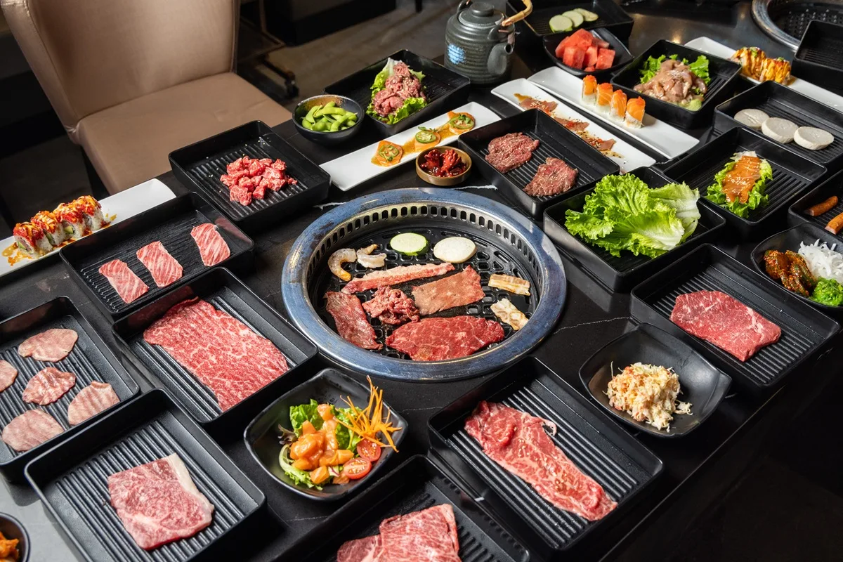 Premium wagyu beef cuts being prepared for the grill